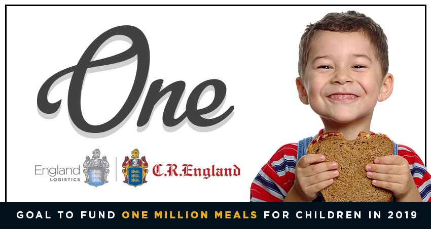 boy smiling holding sandwich next to one initiative logo with england crests