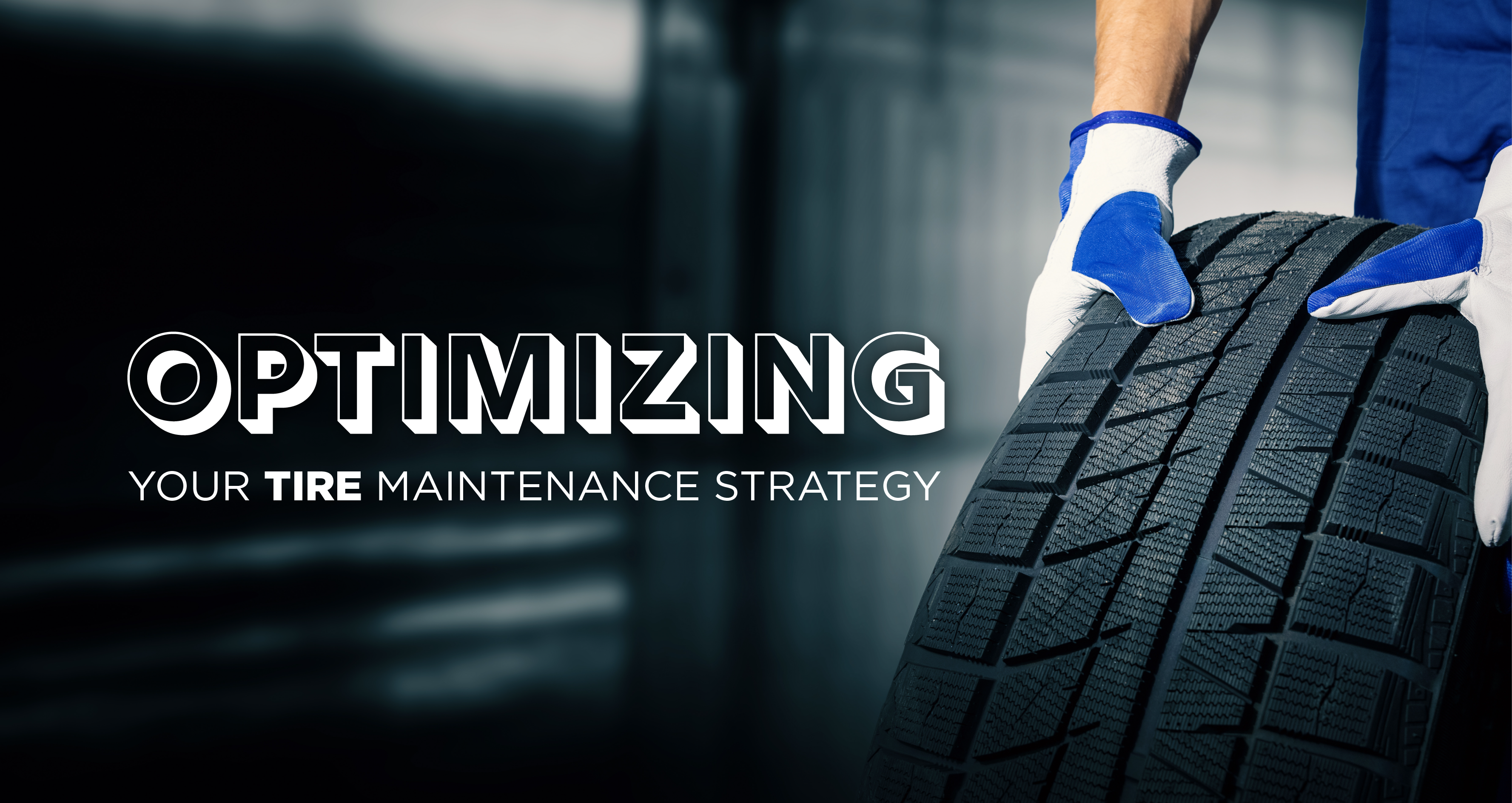 gloved-hands-moving-tire-on-ground